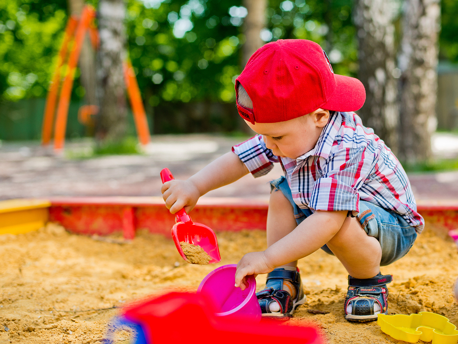 Child playing in a sandbox